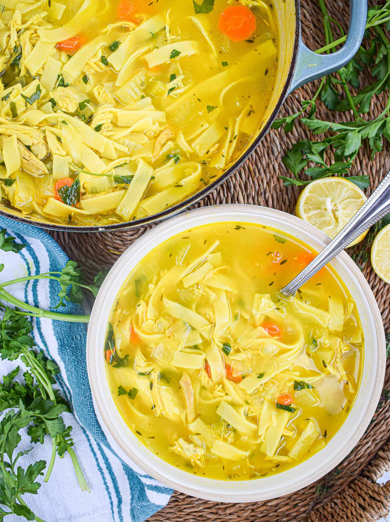 Healing chicken noodle soup with turmeric ginger lemon garlic and egg noodles by the jam jar kitchen 