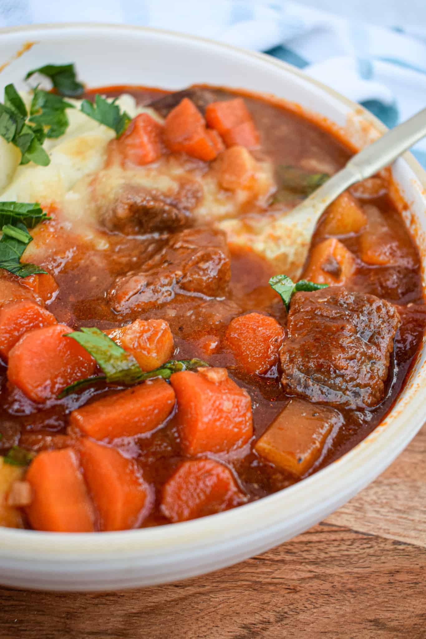 Whole30 Paleo beef stew with root vegetables and dairy free gluten free mashed potatoes