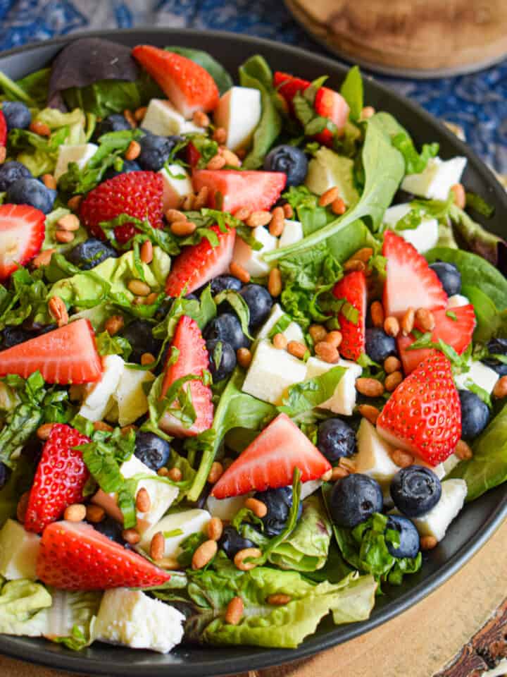 4th of july red white and blue salad with berries mozzarella basil and balsamic