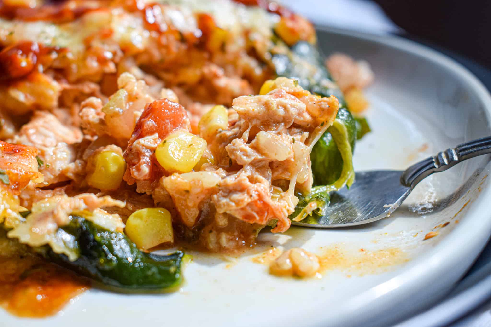 chicken stuffed poblano peppers with corn and tomatoes