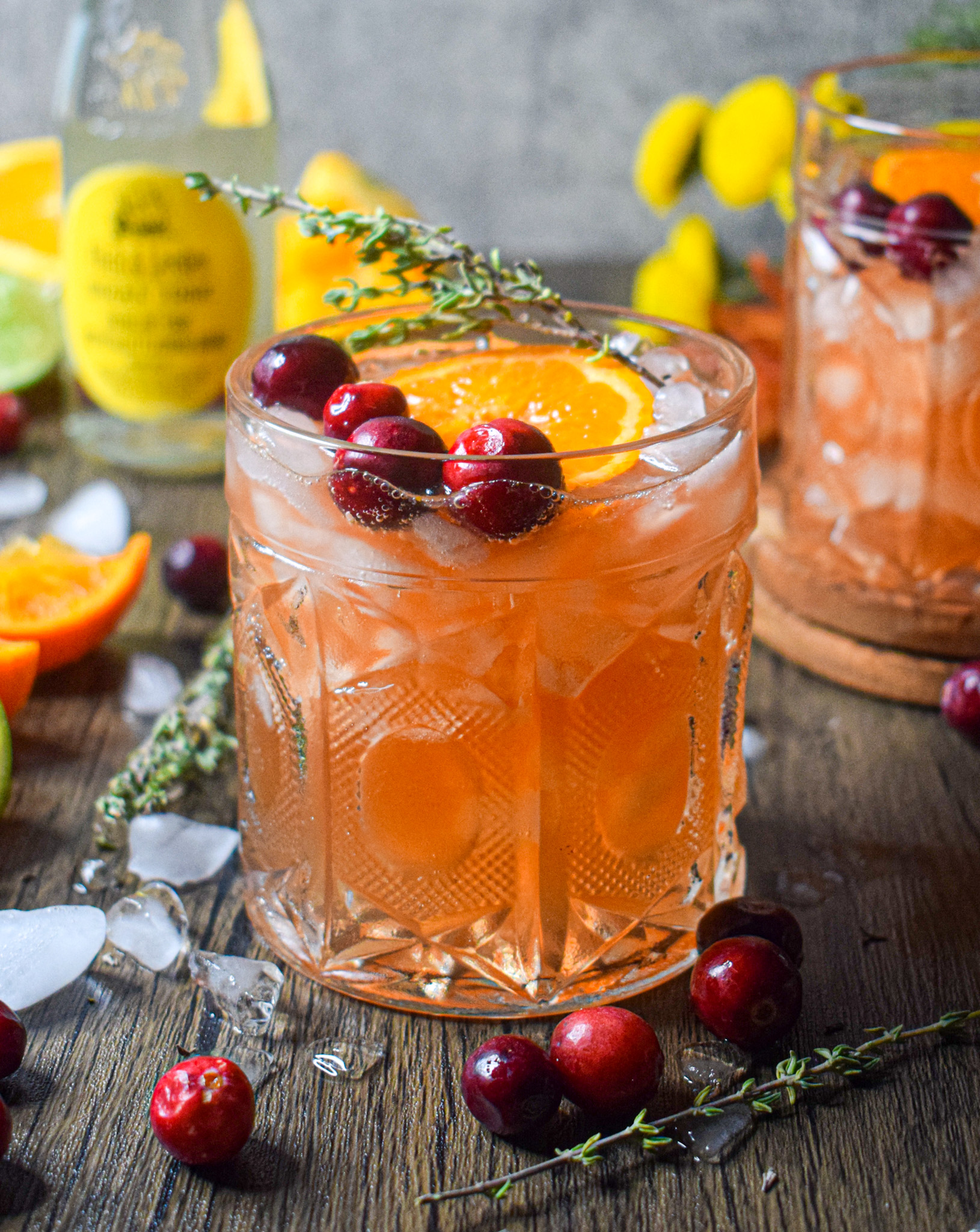 festive whiskey amaretto cranberry orange tonic cocktail recipe for christmas or thanksgiving 