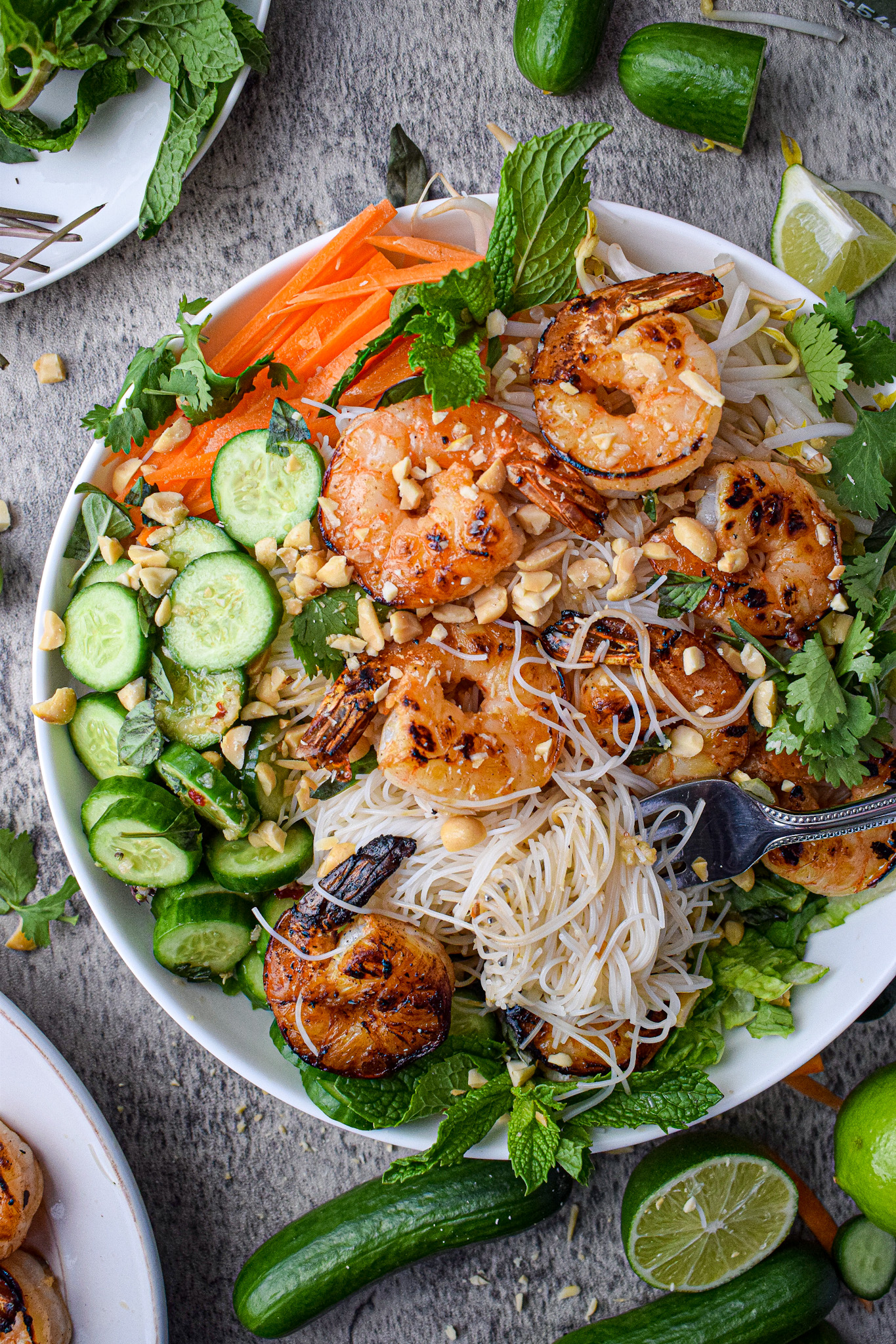 spicy shrimp cucumber noodle bowls with vietnamese vermicelli carrots and herbs