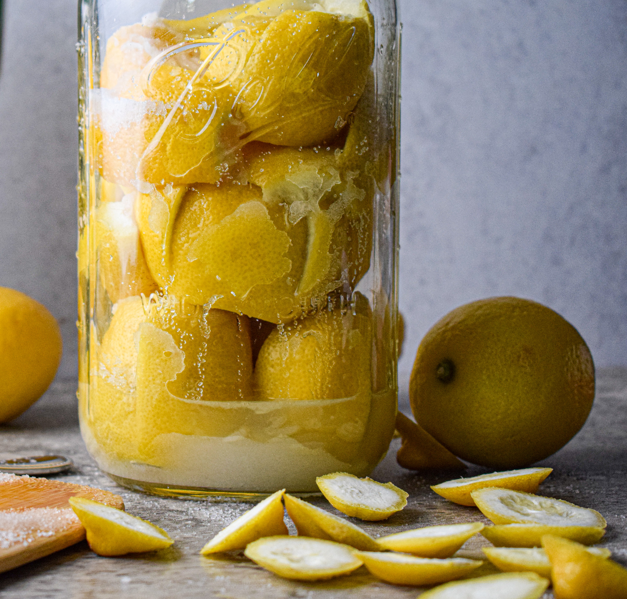 layer the lemons in a large glass jar