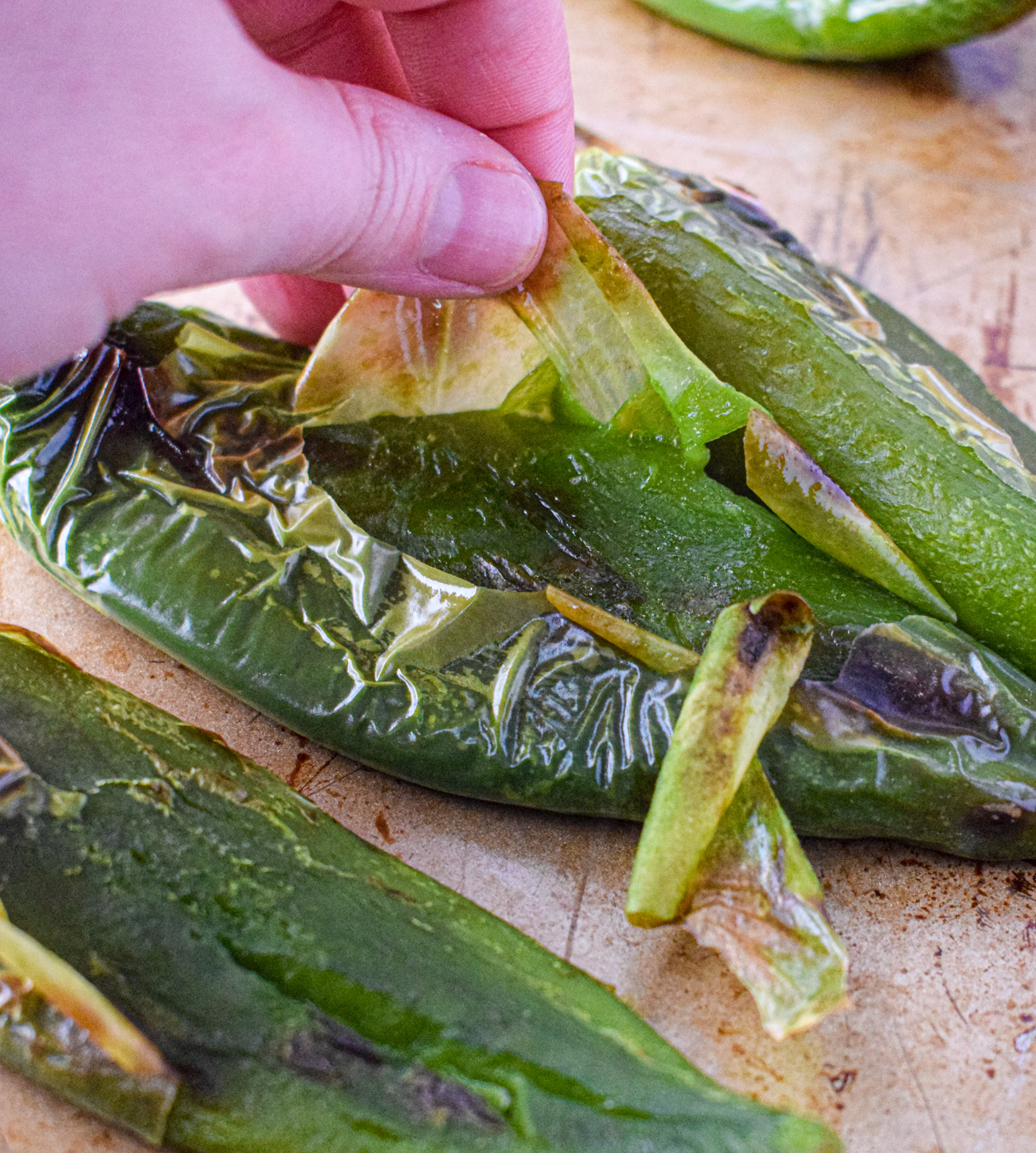 removing the skin from a roasted hatch green chile